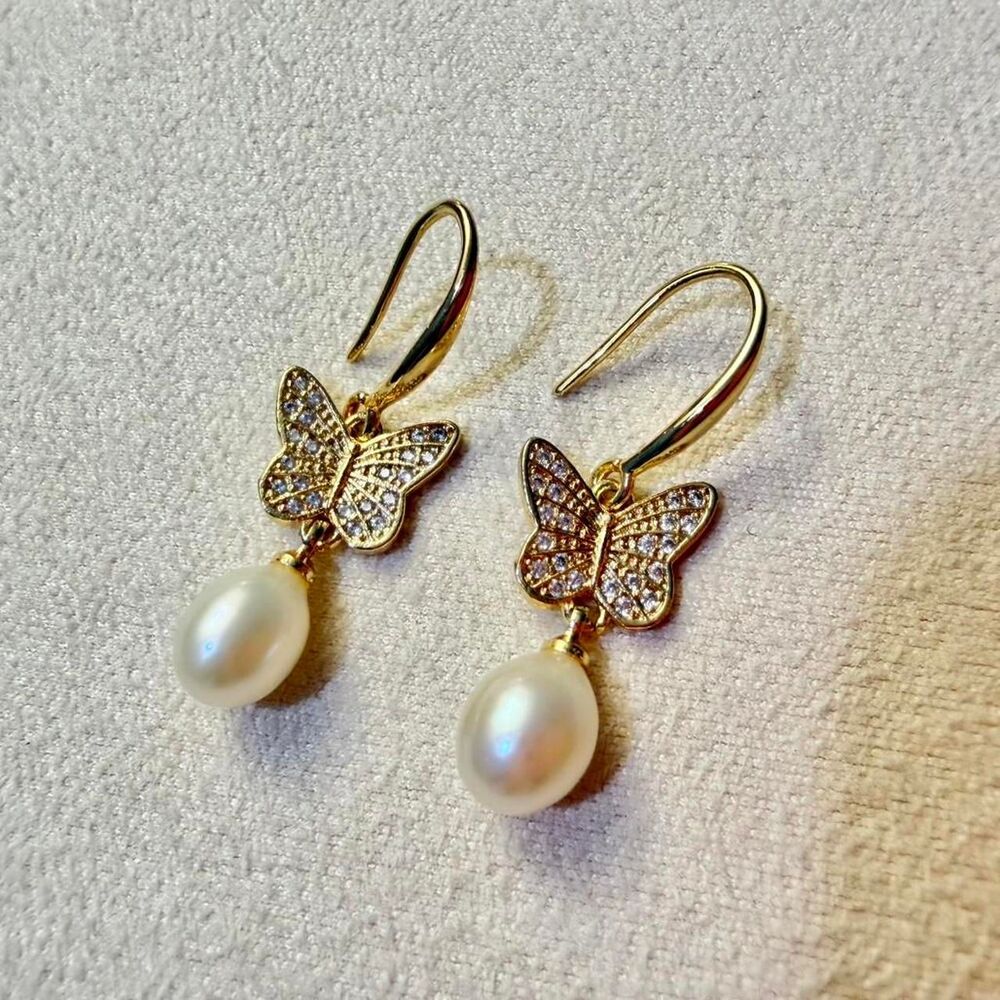 Gold plated butterfly earrings with freshwater pearl